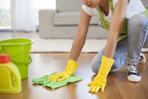 Technician preparing carpet cleaning equipment for a Hanwell property